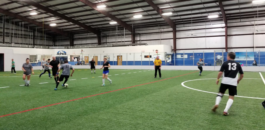 Indoor field house with Sharkstooth turf